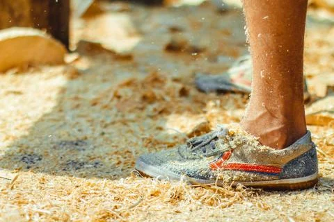 The worker stands in the sawdust Stock Photos