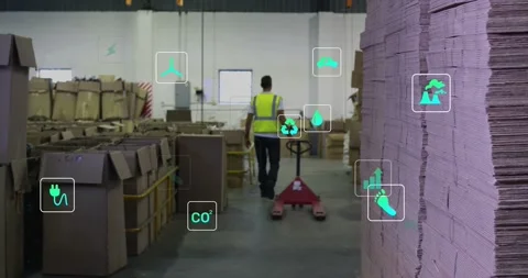 Worker starting walking down center aisle pulling red pallet jack while green Video stock 331789965