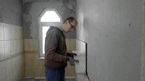 Worker Sticking Tiles Timelapse Stock Footage 47694168