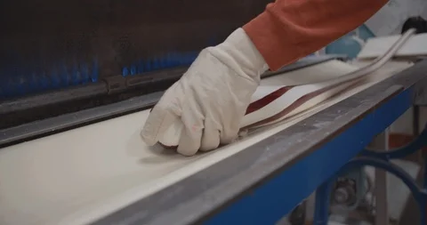 Worker Stretching Candy Rope In Slow Motion 스톡 동영상 105344659