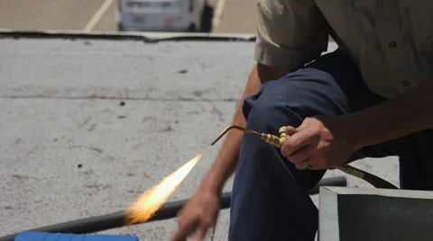 Worker Strikes Welding Torch Stock Footage 64053533