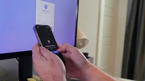 Worker Struggles with Two Factor Authentication Stock Footage 325458467