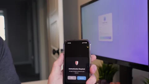 Worker Struggles with Two Factor Authentication Stock Footage 325458480