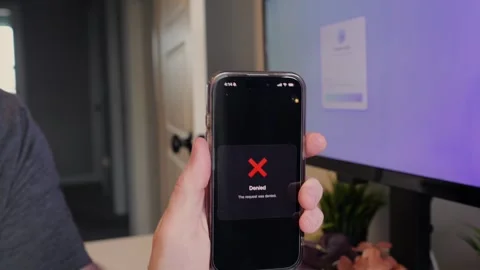 Worker Struggles with Two Factor Authentication Stock Footage 325458486