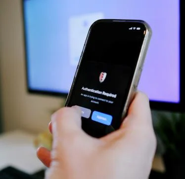 Worker Struggles with Two Factor Authentication Stock Photos