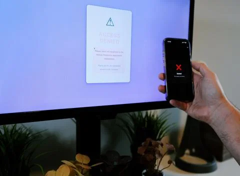 Worker Struggles with Two Factor Authentication Stock Photos
