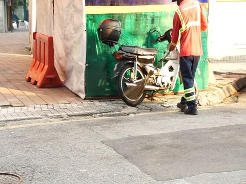 A worker sweeping Video stock 107172557