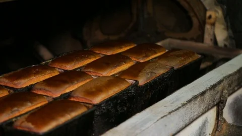 The worker takes out the baking. Stock Footage 74593430
