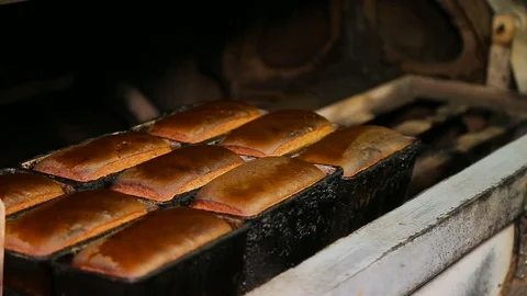 The worker takes out the baking. Stock Footage 74593488