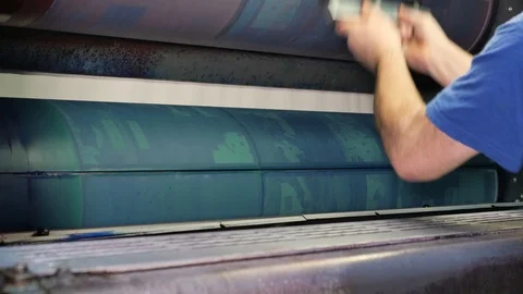 Worker takes off printing plates in press factory Video stock 121811962