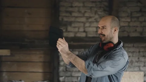 Worker taking pictures of construction site Stock Footage 149293283