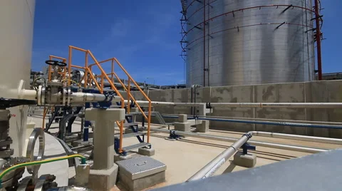 Worker in tank farm Stock Footage 42149792