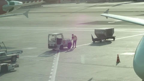 Worker on the tarmac in  slow motion Stock Footage 220058937