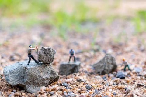 Worker team working on the rock , Team work concept Stock Photos