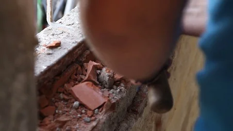 Worker tearing down the wall Stock Footage 75774072