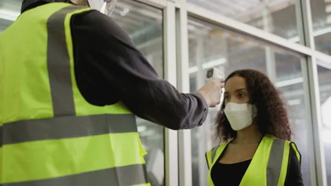 Worker temperature check station before enter working factory to prevent covid19 Stock Footage 159221815