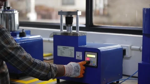 Worker is testing the casting raw materials in different machines 库存影片 305230919