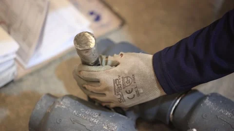 Worker is testing the part with PMI gun nondestructively verify Stock Footage 306220045