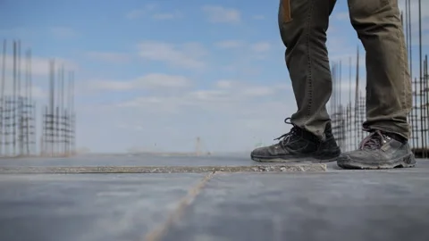 Worker throwing plywood onto formwork Stock Footage 314058575