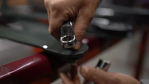Worker Tightening The Screws With Tool - 4k 100 fps - Stock Footage 196148926