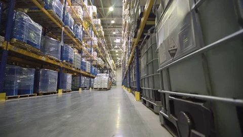 Worker transporting cargo on forklift Stock Footage 76044752