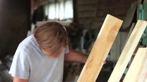 A worker tries on the Board Video stock 66445931