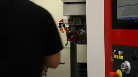 Worker tuning hadware during a work Stock Footage 39770103