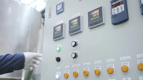 Worker turn on machine 3 switches Industrial Switchboard Close up 50fps Vídeos de archivo 247562937
