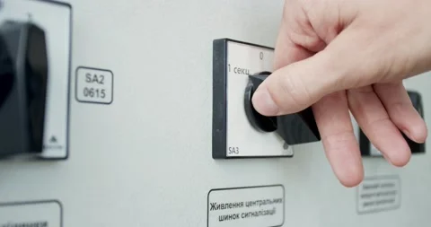 Worker is turning a switch on the control panel, factory, production, 4k Stock Footage 144824415