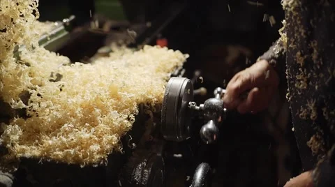 A worker turns the handle of the machine 스톡 동영상 61388221