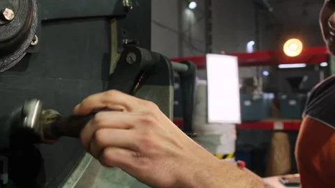 Worker turns sample spoon checking readiness of coffee bean Stock Footage 266147731