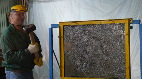 Worker In Uniform And Protective Screen, Yellow Gloves, is Beating the Glass Stock Footage 53012850