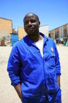 Worker in uniform posing Stock Photos