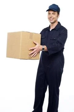 Worker unloading and loading carton Stock Photos