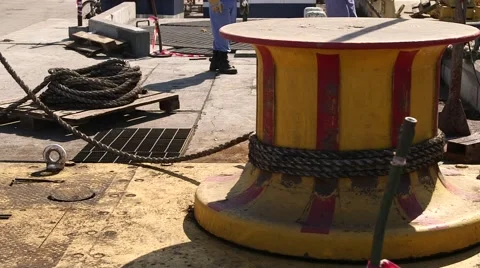 Worker Unwinds The Spool Of Rope Stock Footage 63988403
