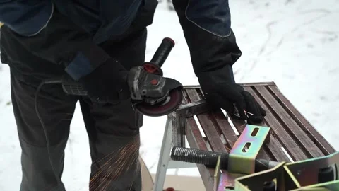 Worker use an Angle Grinder producing. Worker grinding meta Stock-Footage 261173375