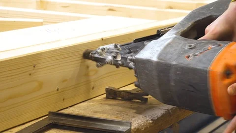Worker use nail gun to build wood wall Stock Footage 110568489
