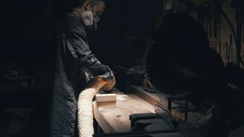 Worker use vacuum cleaner for collect shavings after work with electric sander,  스톡 동영상 78710774