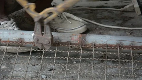 Worker used  Plier cut metal mesh Stock Footage 83784633