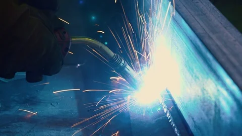 Worker uses a gas welding torch to connect the seam of the metal part Video stock 110699493