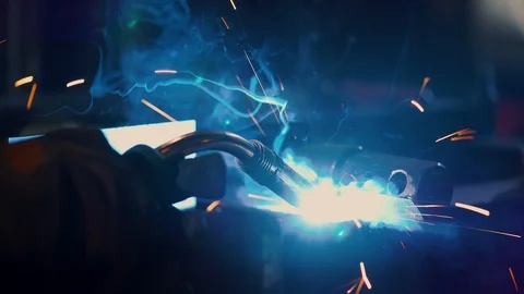 Worker uses a gas welding torch to connect the seam of the metal part Stock Footage 110699537