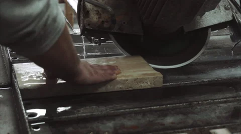 Worker uses saw machine for cutting marble stone, close up 스톡 동영상 68073632