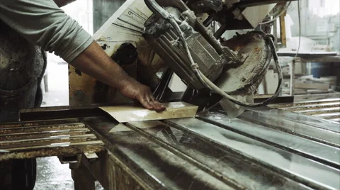 Worker uses saw machine for cutting marble stone piece , close up 스톡 동영상 68073690