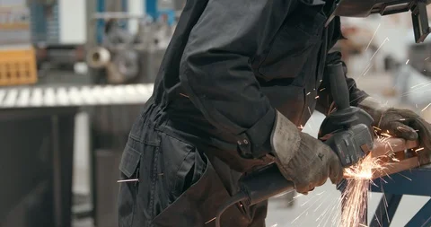 Worker using angle grinder 2 Stock Footage 103775136