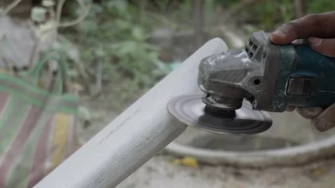 Worker Using Angle Grinder Stock Footage 336689729