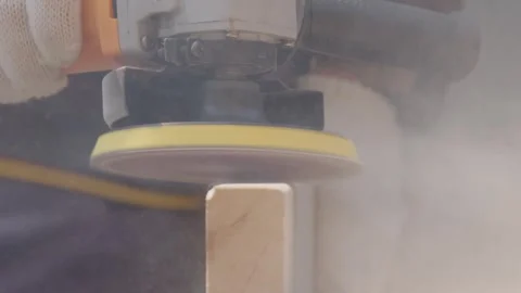 Worker Using Angle Grinder to Sand Wooden Block Close-up Stock Footage 336561589
