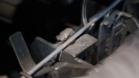 Worker using bending machine bender rebar on concrete factory Stock Footage 70208207