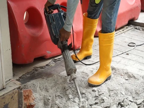 Worker using cement drill. Stock Footage 107173186