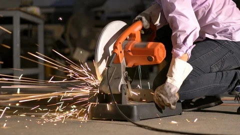Worker using cutter circular metal has lighting spark. Stock Footage 93603650