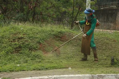 Worker using cutter Stock Photos